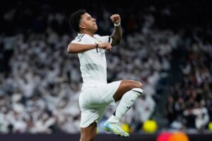 Selebrasi Rodrygo dalam laga Liga Champions antara Real Madrid vs Atletico Madrid, Rabu (5/3/2025). (c) AP Photo/Manu Fernandez