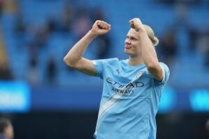 Selebrasi penyerang Manchester City, Erling Haaland usai mencetak gol ke gawang Burnley di lanjutan Liga Inggris 2025-2026. (c) AP Photo/Jon Super