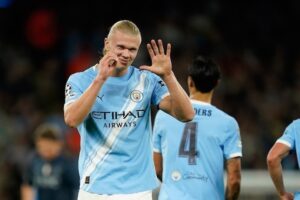 Selebrasi Erling Haaland usai mencetak gol dalam laga Manchester City vs Napoli di Liga Champions 2025/2026, Jumat (19/9/2025). (c) AP Photo/Dave Thompson