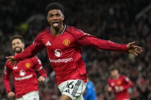 Ekspresi Amad Diallo usai membobol gawang Manchester United, Selasa (16/12/2025) (c) AP Photo/Jon Super