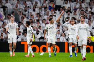 Selebrasi Jude Bellingham dkk. dalam laga La Liga antara Real Madrid vs Sevilla, Minggu (21/12/2025). (c) AP Photo/Manu Fernandez