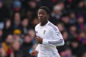 Gelandang Manchester United, Kobbie Mainoo (c) AP Photo/Dave Shopland