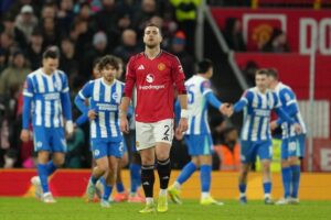 Pemain Manchester United, Diogo Dalot usai laga melawan Brighton di Piala FA, 11 Januari 2026. (c) AP Photo/Jon Super